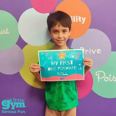 That's how we roll. Celebrating milestones is an important part of the journey. We are so proud of this grade schooler for nailing his first dive forward roll. A fantastic achievement.