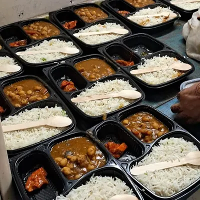 Our Ganesh Chaturthi special meal boxes, featuring delicious onion and garlic free food like Chole, Rice, and Pickle.