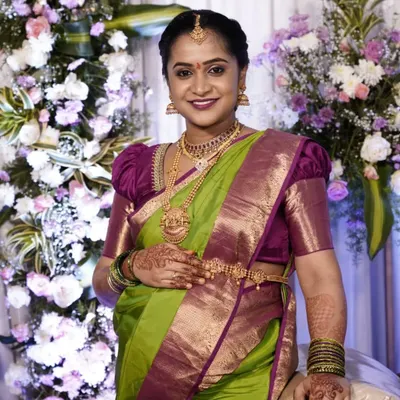 This happy client is ready for her baby shower. She rented this beautiful temple jewellery set from me to pair with her green and purple silk saree.