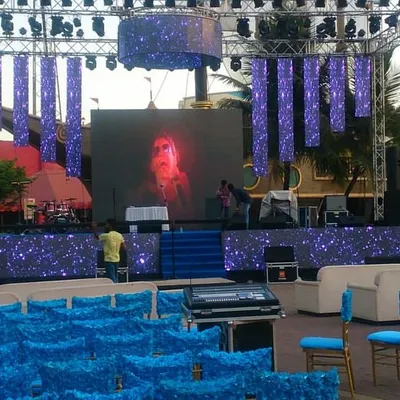 A spectacular Sangeet stage setup at an outdoor venue in Lonavala. We provided a complete solution with a large stage, trussing, LED screens, professional sound systems, and elegant seating for guests.