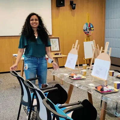 Setting up for a creative art workshop with the employees at Google. I provide all the materials, including easels, canvases, and paints, so the team can dive right into the artistic experience.