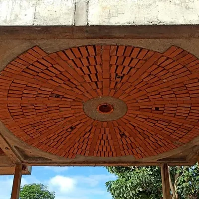 This brick dome is a signature example of our 'True Ceiling' work. The intricate radial pattern is not just decorative; it's a structural slab that showcases the beauty of exposed brick and provides excellent insulation.