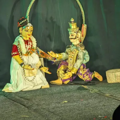 A scene from our production 'Poetry in Puppetry'. This image captures an intimate moment between two string puppets, showcasing the delicate manipulation and artistry required to convey emotion and tell a compelling story.