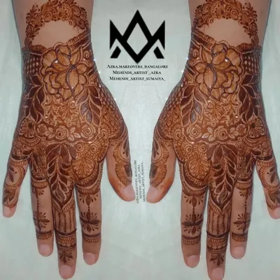 A beautiful and unique design for Karva Chauth, featuring a floral pattern with a negative space cuff.