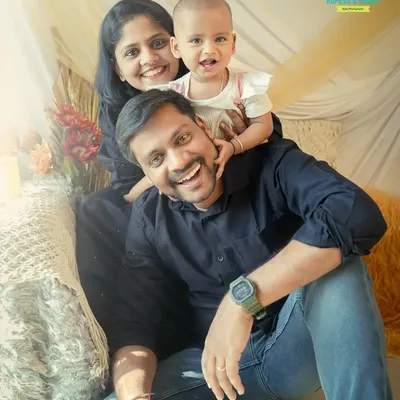 Pure happiness in one frame. We love capturing these playful family moments where everyone's personality shines through.