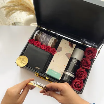 A luxurious Rakhi hamper for your brother, featuring a leather wallet, perfume, and a personalized stainless steel 'Best Bro' bracelet.