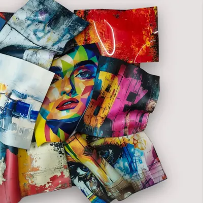 "Marilyn in Bloom," a 50" x 38" polycarbonate and aluminum installation. This pop art sculpture fuses iconic imagery of Marilyn Monroe with abstract textures, celebrating her bold spirit through layered, flowing prints.