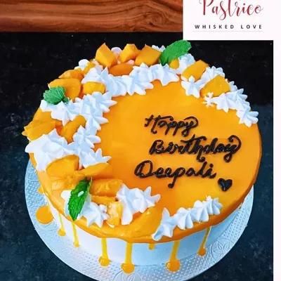 My Fresh Mango Cake is a seasonal bestseller. It's made with a light sponge, fresh mango pulp, and topped with chunks of the finest mangoes and mint leaves.