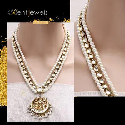 If you love pearls, this layered Kundan and pearl long necklace is the perfect piece for you. It features a beautiful crescent-shaped pendant and adds a touch of vintage elegance.