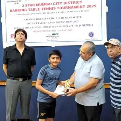 One of our young champions, Arnav Bhatter, receiving his trophy for reaching the semi-finals in the U-11 Boys category at the 3-Star District Ranking Tournament.