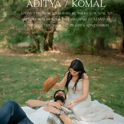 A romantic picnic scene, with the groom resting in the bride's lap. The poetic overlay adds a touch of heartfelt emotion to this beautifully styled concept shoot.