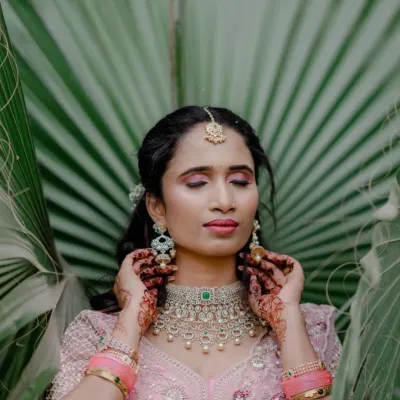 A beautiful engagement look. I used soft pink and mauve tones on the eyes and lips to complement her pastel lehenga, creating a romantic and dreamy feel.
