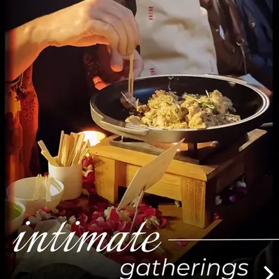 A live cooking station is perfect for intimate gatherings, allowing guests to interact with our chefs and customize their food.