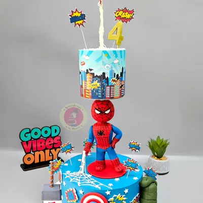 With great power comes a great cake. This Spiderman anti-gravity cake features two tiers of action, with Spidey figurines mid-air and ready for adventure.