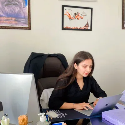 Focused on my work at the office. A significant part of legal representation involves detailed work on a laptop, from drafting petitions to researching case law for hours on end.