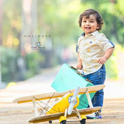 Up, up, and away. This little pilot theme is a favorite for capturing a sense of wonder and adventure. I provide the vintage-style airplane and aviator props for the complete look.