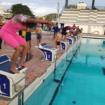 On your marks! My swimmers are poised on the starting blocks, ready to dive in for a time trial. Practicing starts under pressure is key to gaining an edge in a real race.