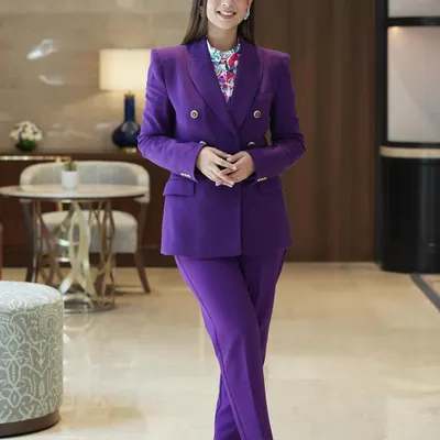 Basking in hues of purple. This formal blazer and pantsuit was my choice for a corporate event, projecting confidence and style.