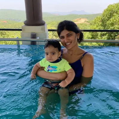 A mother's reassuring hold is the best foundation for building water confidence.