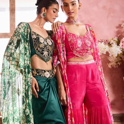 A beautiful duo look featuring complementary makeup styles. One model wears a soft glam look with a pink-toned lip, while the other has a slightly bolder eye, showcasing my ability to create cohesive looks for your bridal party.