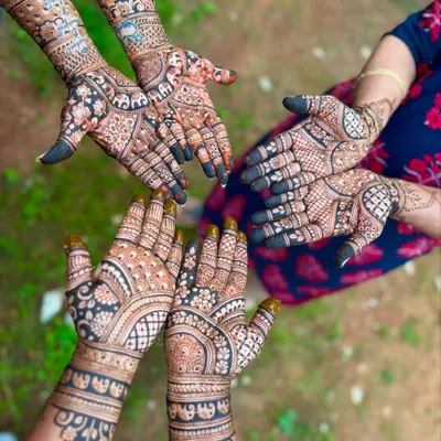 A beautiful shot capturing the mehendi for the bride and her loved ones. We can create coordinated designs for your entire bridal party.
