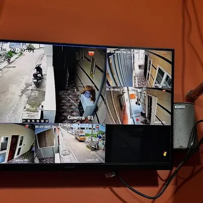 A multi-view display from a Hikvision 4MP IP camera installation. This setup allows the client to monitor the street, entryway, and different sides of their house simultaneously.