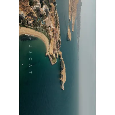 An aerial view of the stunning Muscat coastline, the setting for a beautiful destination wedding. I work to find locations that not only offer beauty but also a unique experience for you and your guests.