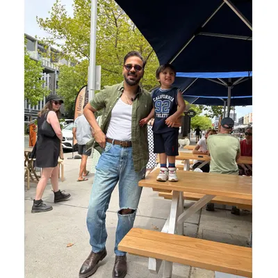 Enjoying a casual day out in Australia with my son. My personal experiences living and raising a family down under provide me with unique insights that I share with my migration consultancy clients, helping them understand the lifestyle and opportunities.