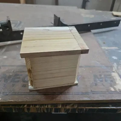 This simple box, made without any nails or screws, is a perfect exercise in precision. The lid was cut from the main body on a bandsaw after glue-up, creating a perfectly seamless fit.