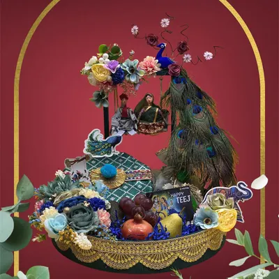 For Teej, we go all out with traditional elegance. This elaborate hamper features peacock feathers, intricate floral work, and classic motifs like elephants, all designed around the special gifts you want to include for your loved ones.