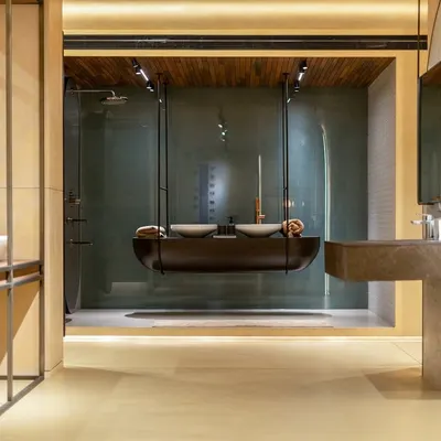 The suspended dual vanity at the Grohe showroom in Kochi is a prime example of my branded environment design. It's a functional display that also serves as a memorable art piece, defining the store's modern identity.