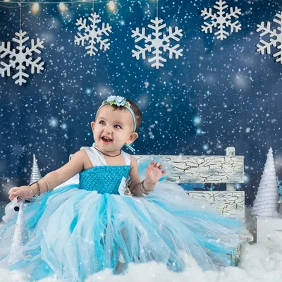 Our very own Queen Elsa in her winter wonderland. This Frozen-themed photoshoot is perfect for little ones who love to sing "Let It Go!"