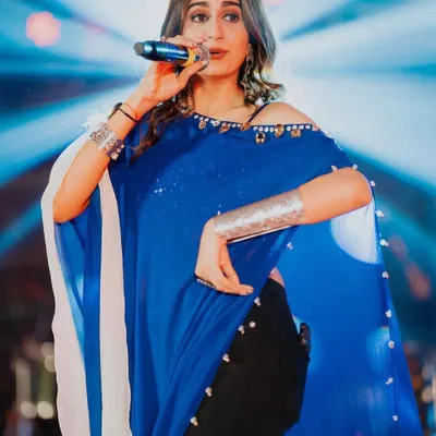 The amazing Kinjal Dave owning the stage. I styled her in our oxidized silver arm cuffs and a statement choker to match her powerful performance vibe.