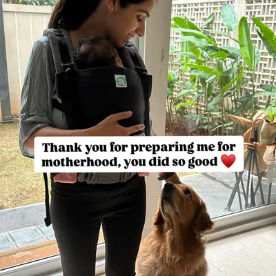Happy birthday to the one who prepared me for motherhood and lights up our world. This picture captures the beautiful bond that's possible when we raise our children, both human and canine, with love and respect.