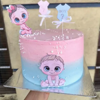 If you're not a fan of fondant but still want cute characters on your cake, edible prints are the perfect solution. This baby shower cake uses colorful cutouts on a beautiful pink and blue ombre buttercream base.
