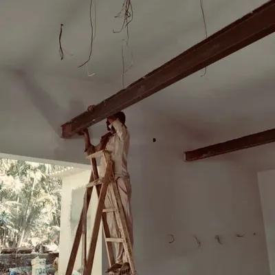 The dedication of construction workers is imperative for a high-quality finish. They work tirelessly to bring our ideas to life, and this image captures a moment of that hard work during the interior fit-out of a villa project.