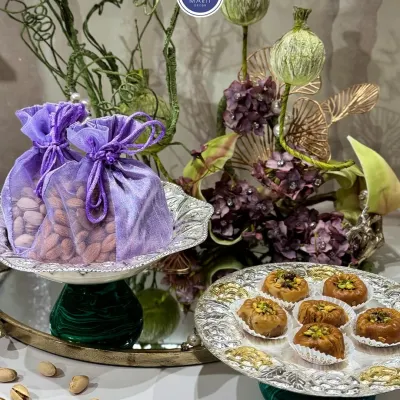 I designed the Emerald Glow-Bowl and Gulzar Platter to bring grace to every occasion. The silver platter with its intricate base is perfect for serving sweets, while the bowl is ideal for dry fruits.