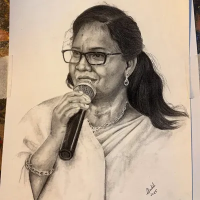A look at our skills in traditional mediums. This is a highly detailed A3 charcoal portrait, showcasing our ability to capture a realistic likeness and expression with classic techniques.