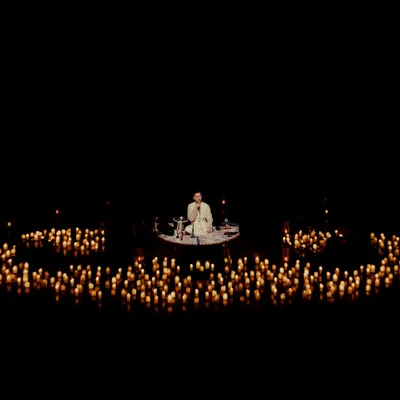 A wide shot of the candlelit setup at Tagore Theatre in Chandigarh. This ambiance is perfect for creating a focused, meditative environment for corporate wellness events or private spiritual gatherings.