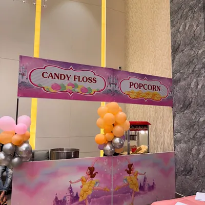 Sweet treats for a sweet occasion. We set up this adorable candy floss and popcorn station as part of a princess-themed baby welcome ceremony, adding a fun and tasty element for guests.
