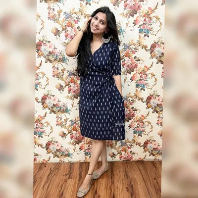 Wrap yourself in tradition with our bestselling Angrakha, crafted from pure handloom Ikat. This navy blue wrap dress offers timeless elegance and modern style.
