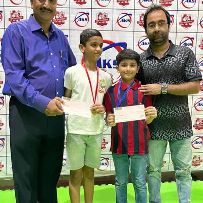 Here are two of our youngest champions proudly holding their prizes. My tournaments offer a supportive environment for players starting their competitive journey in badminton.