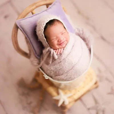 Let me brighten your weekend. This gorgeous smile is pure newborn joy. It's a reminder that even if babies don't sleep the whole session, we can capture incredibly heartwarming moments.