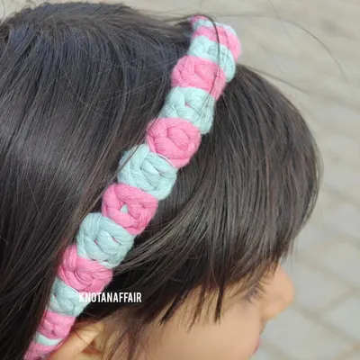 A close-up of my macrame rose flower hairband, worn by a happy little customer. This two-tone pink and mint design is stylish, comfortable, and perfect for both casual and special occasions.