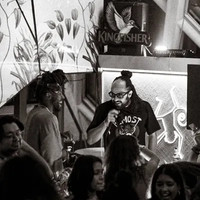 More than just a DJ, I’m an MC rooted in sound system culture. This shot captures me on the mic, hosting the night and keeping the crowd's energy high. I can run the show or just hype the vibe, whatever the event needs.