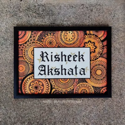 A custom mandala nameplate created for a client in Singapore. I combine intricate doodle-style mandalas with elegant calligraphy to create a personalized piece of art that welcomes you home.