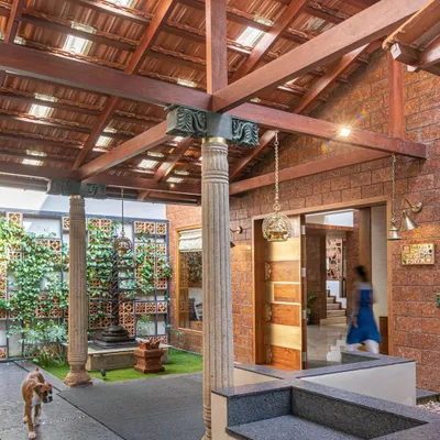 A traditional Indian courtyard concept, reimagined. We used reclaimed stone pillars and a vertical garden wall to create a grand, green entrance that feels both rustic and deeply connected to nature.