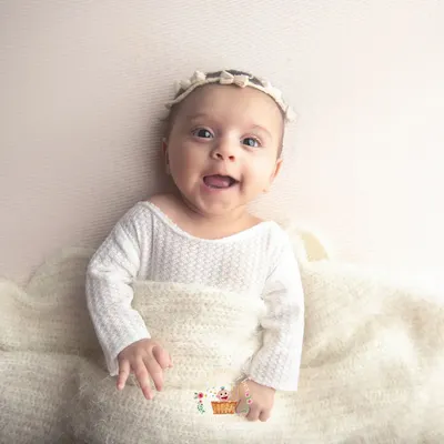 I just love the smiles of older babies. This little one is two months old, and her personality is already shining through. Don't worry if you miss the newborn window; we can capture beautiful, connected moments at any age.