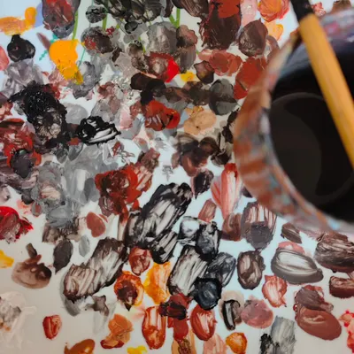 Paint-splattered tables and brushes that feel like an extension of our hands. For us, it's not about the outcome; it's about the process of becoming through each creation.