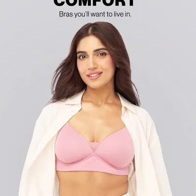 In this shot for Nykd by Nykaa, I styled Bhumi in a simple, unbuttoned white shirt over a pink bra. This created a relaxed, approachable look that shows you can truly live in this lingerie, aligning with the campaign's 'crave this comfort' message.